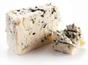 Blue cheese on a white background.